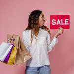 a-woman-holding-shopping-bags